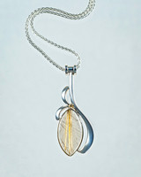 Rutilated quartz pendant 60mm x 25mm