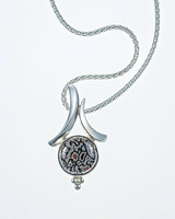 Dinosaur bone pendant 40mm x 25mm